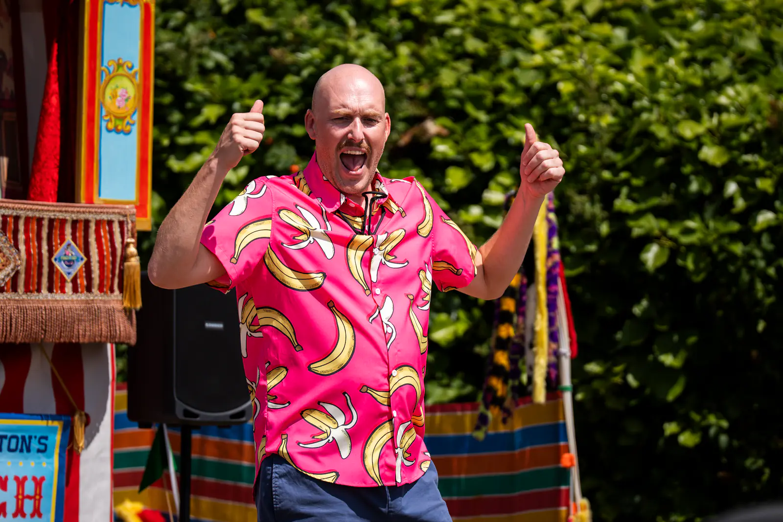 A Punch and Judy performer greeting the audience during the celebrations