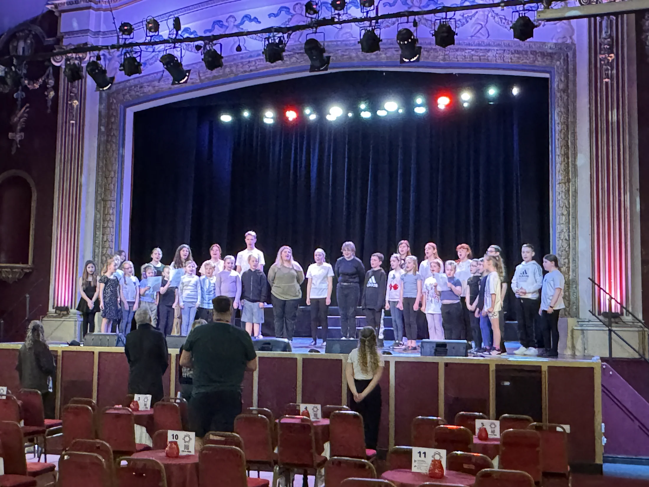 The Pavilion community cast rehearsing together on stage