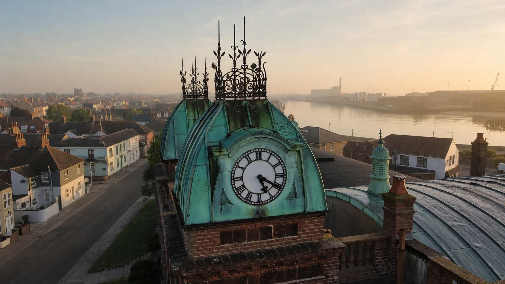 The Pavilion Theatre clock tower overlooking Gorleston and the river at sunrise